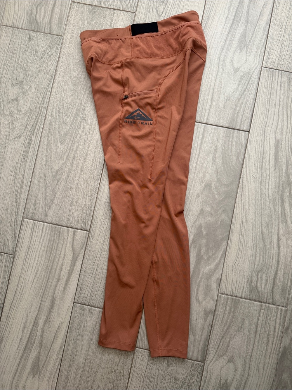 Nike Rust-Orange Trail Leggings with Side Pocket